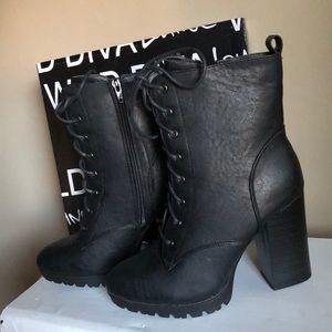 Combat black heeled booties